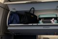 Don’t grab your bags in an airplane emergency, industry body warns