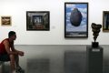 Famed Magritte painting damaged by child with pine cone