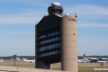 Two planes nearly collided in Boston after a false alarm and a controller forgot who he cleared for takeoff, the NTSB reports