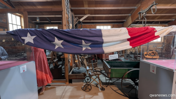 A 48-star US flag, the size of a single bedroom apartment, has draped a Minnesota community in red, white and blue mystery